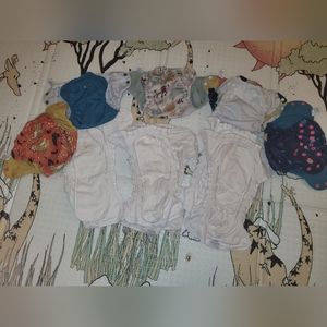 Lot of Esembly cloth diapers and outers, size 1